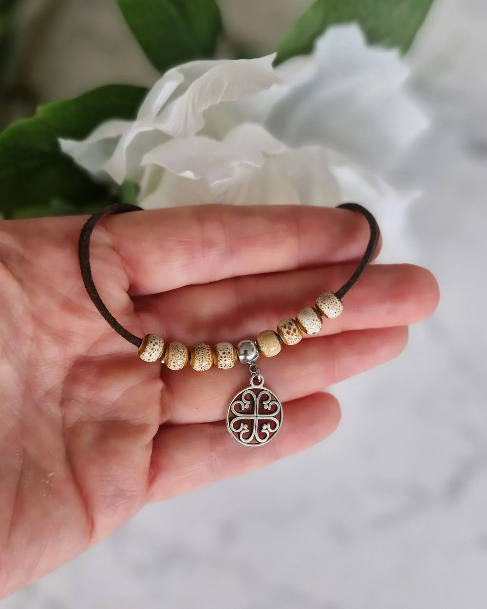 Circle of Hearts ceramic beaded bracelet styled for a romantic everyday look