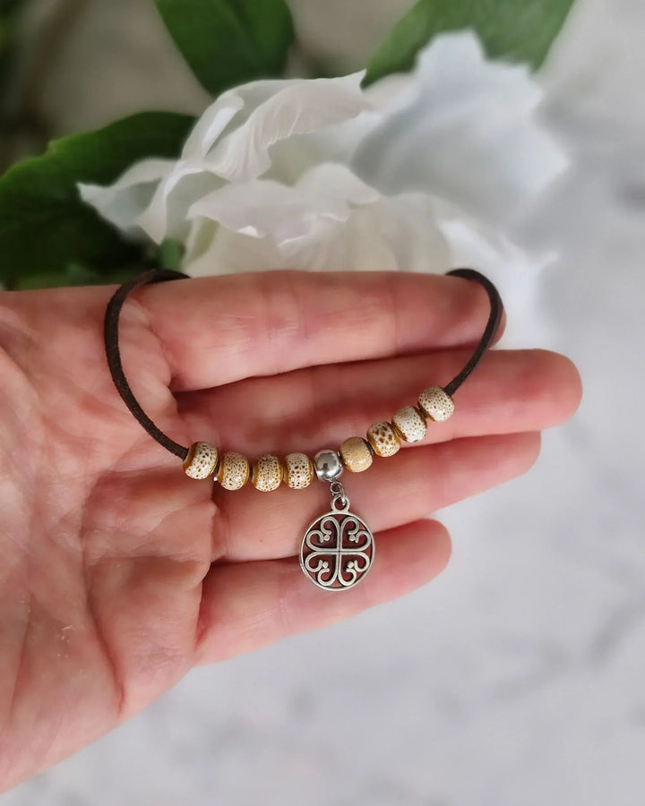 Circle of Hearts ceramic beaded bracelet styled for a romantic everyday look