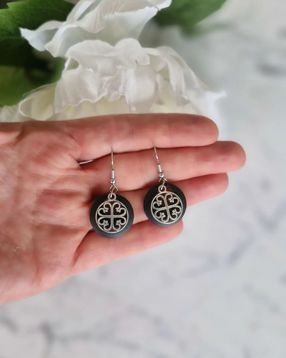 Black Circle of Hearts earrings styled for a romantic everyday look