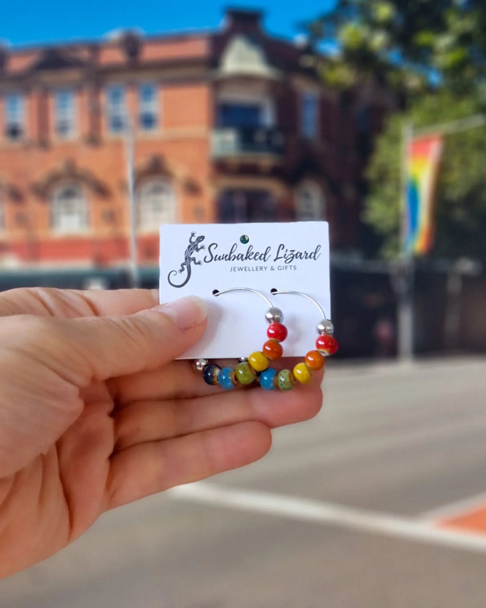 Rainbow Pride hoop earrings with colourful ceramic beads