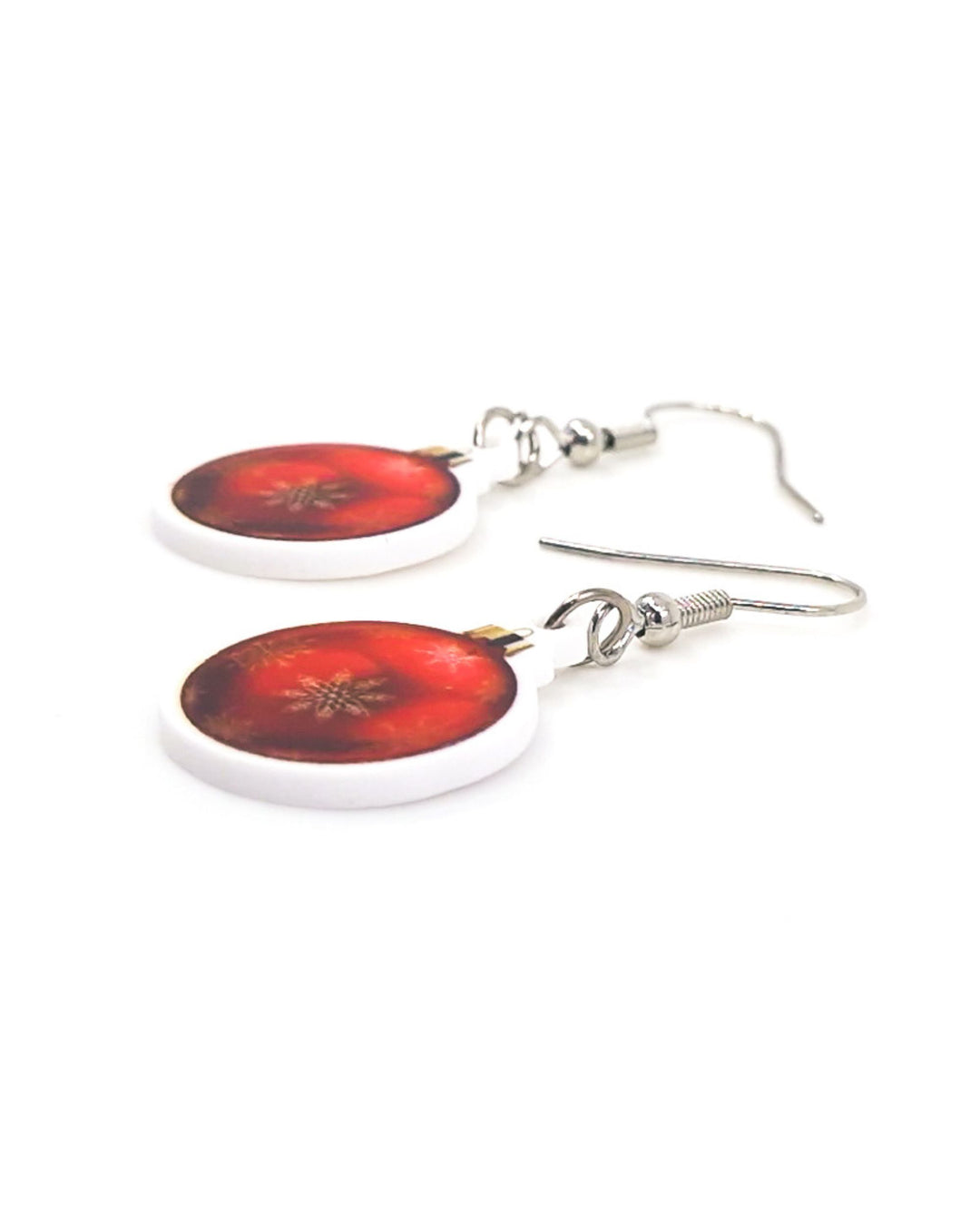 Close up of 2D Red Bauble Earrings showing detail