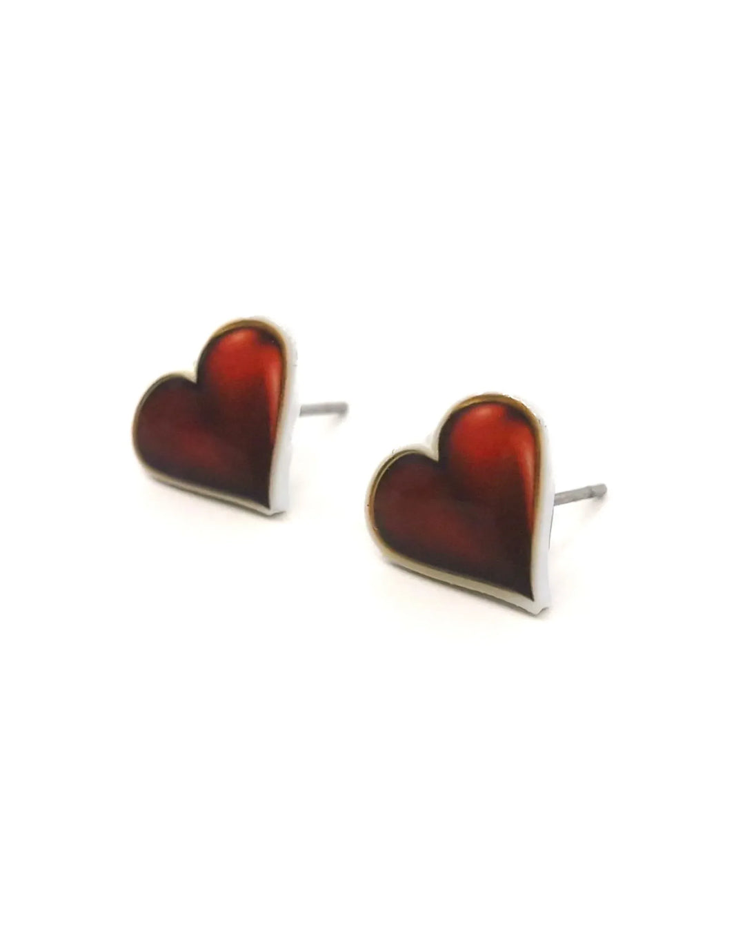 Side view of shiny red heart stud earrings showing heart shape and post backing
