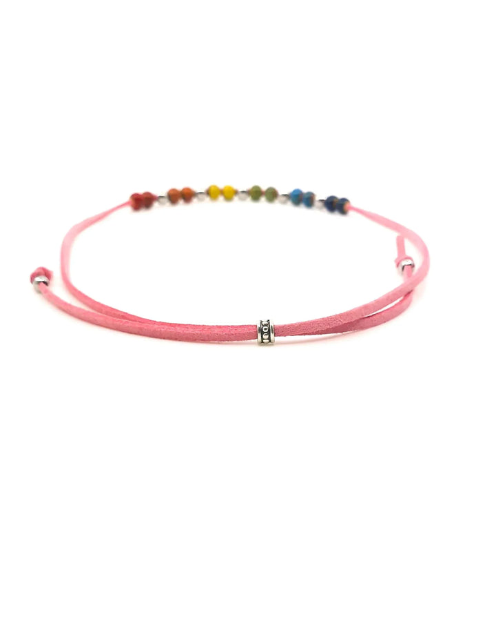 Close-up of rainbow ceramic beads on Rainbow Pride necklace