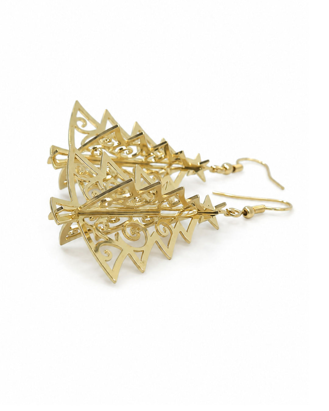 Side view of 3D gold Christmas tree earrings showing the crossed panels and depth