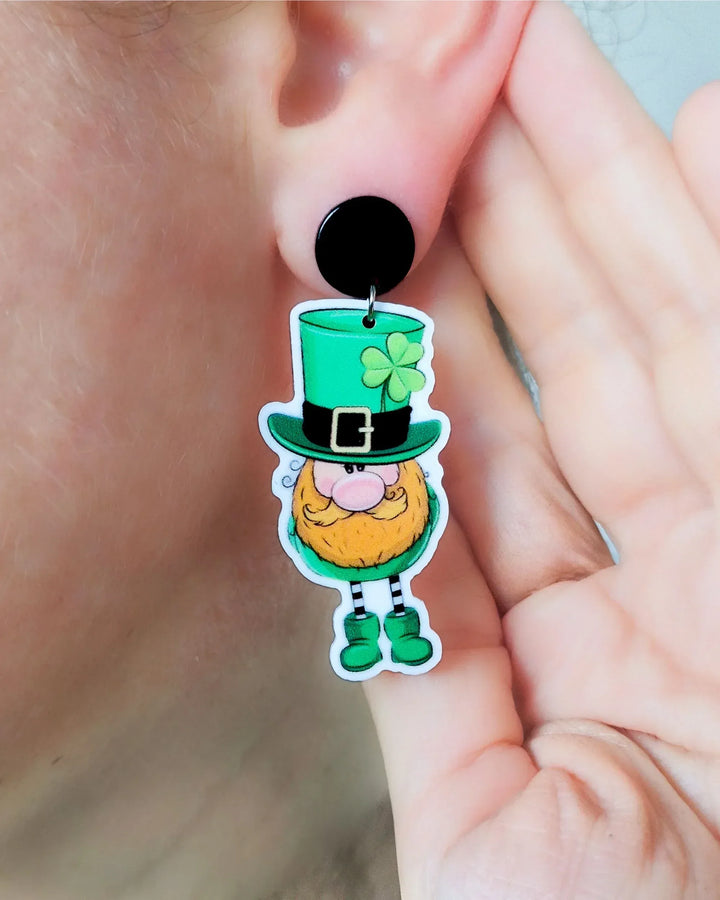 Lucky Leprechaun drop earring worn on ear to show scale and movement