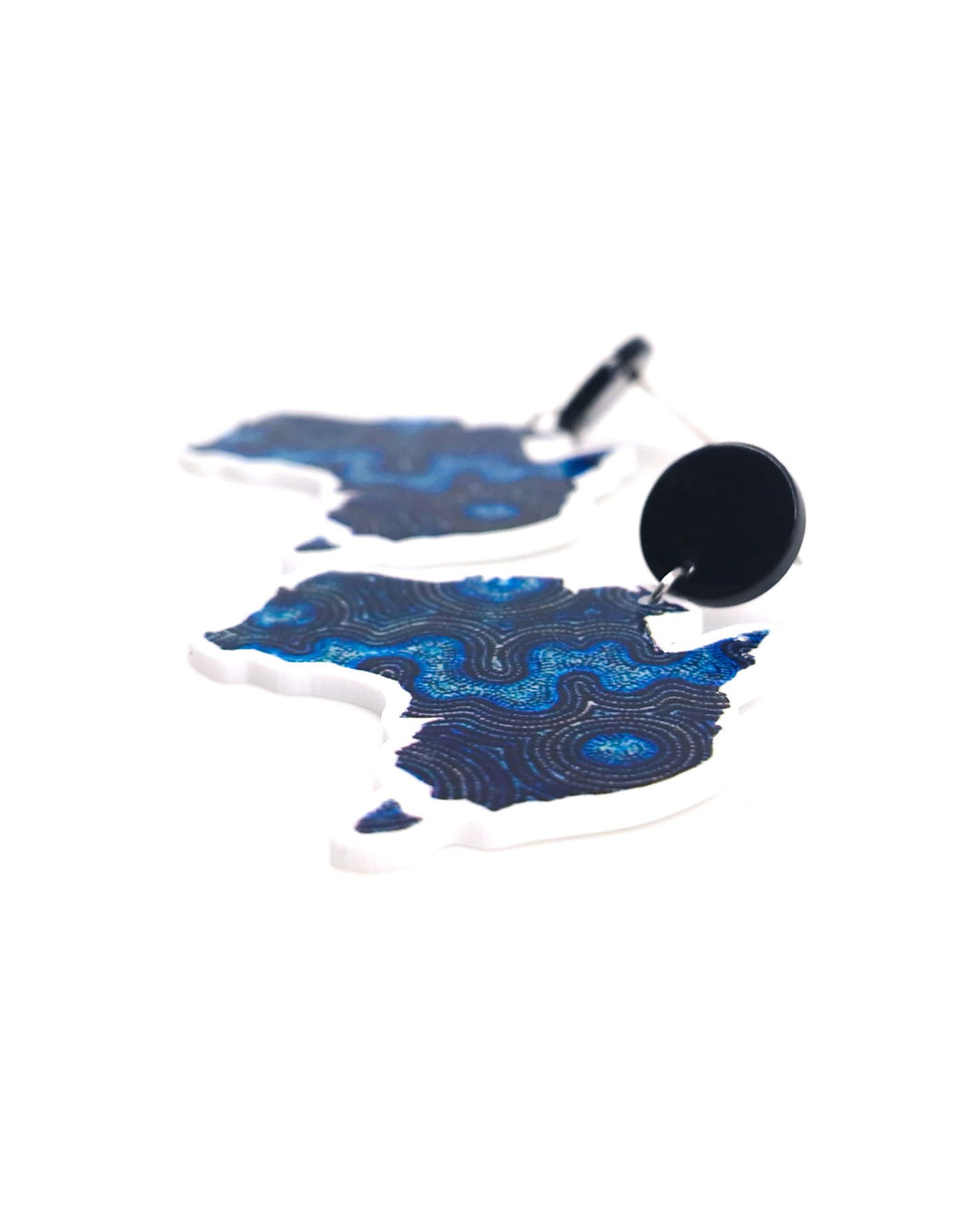 Blue Dreamscape Australia map earrings featuring swirling dot-style design on a white background showing detail