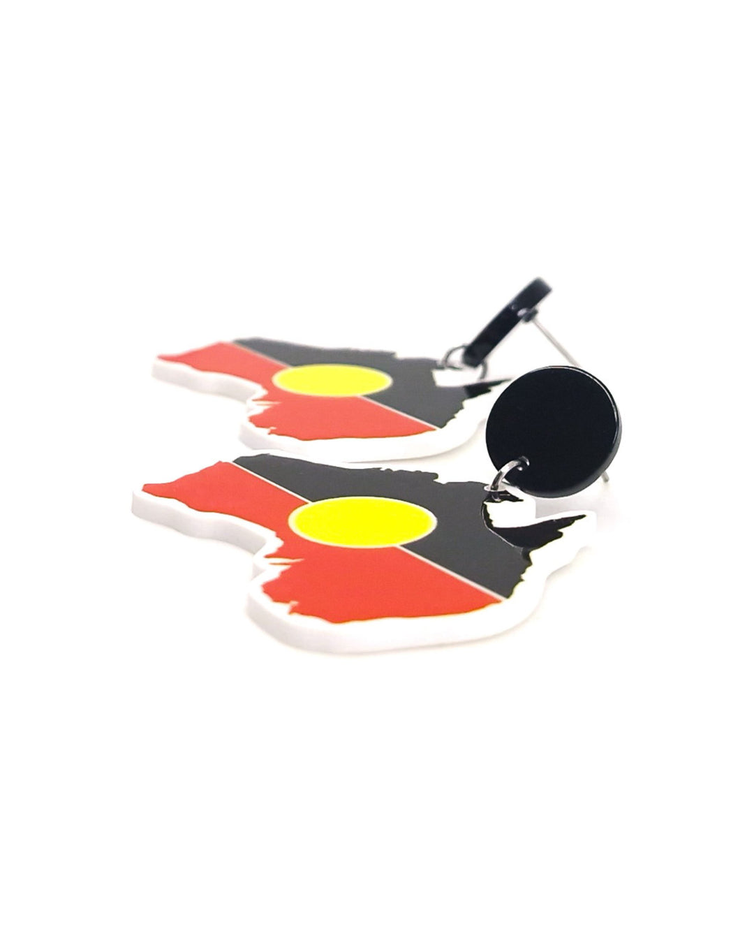 Close-up showing detail of Australia map earrings with Indigenous inspired black, red and yellow colour design.