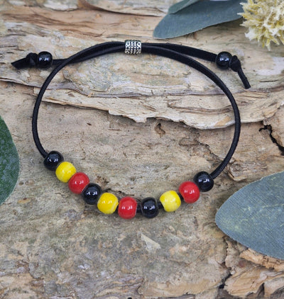 Red, Yellow, and Black Beaded Bracelet Sunbaked Lizard Jewellery & Gifts