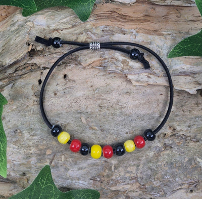 Red, Yellow, and Black Beaded Bracelet Sunbaked Lizard Jewellery & Gifts