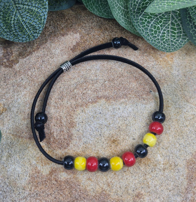 Red, Yellow, and Black Beaded Bracelet Sunbaked Lizard Jewellery & Gifts
