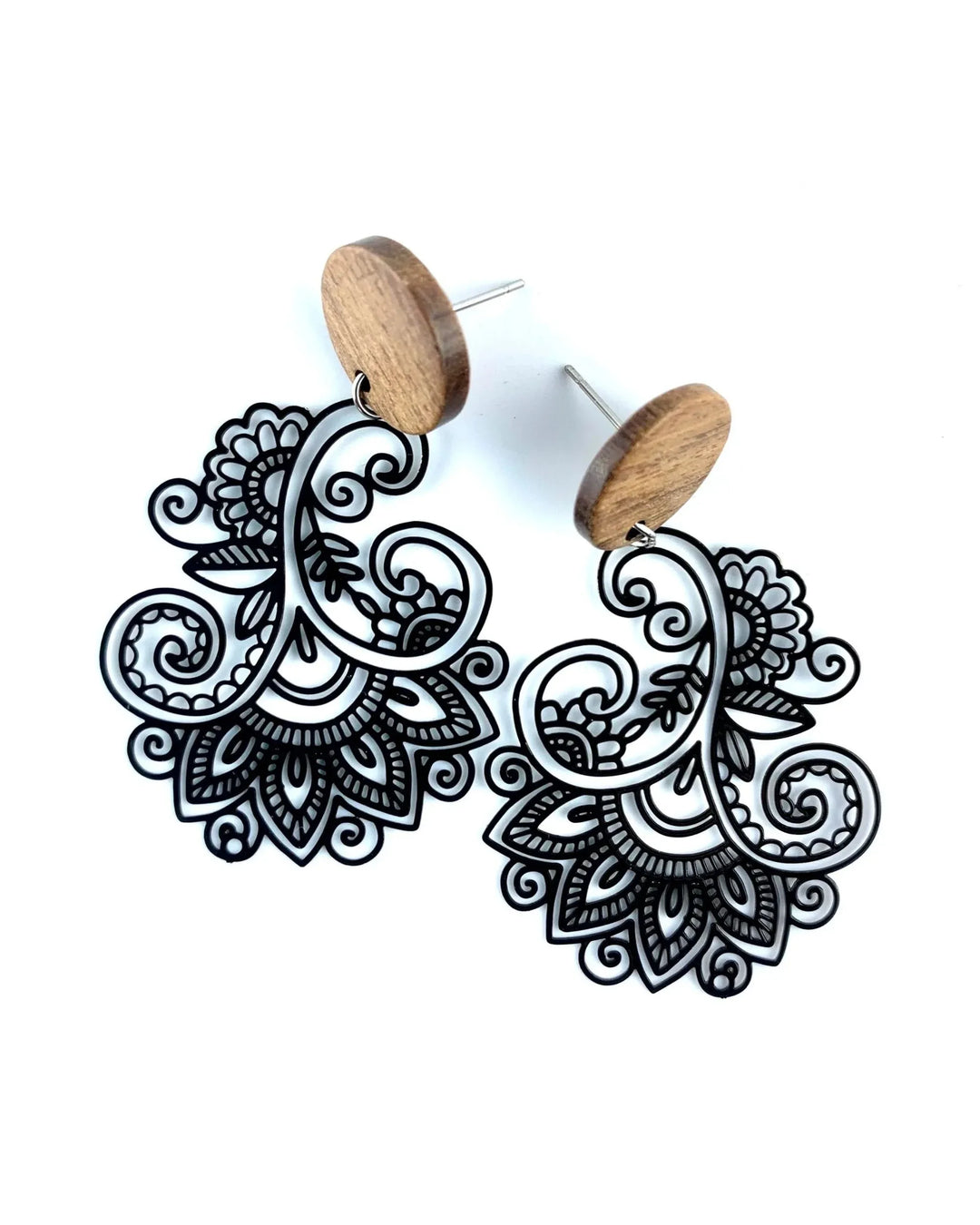 Black filigree drop earrings with wooden stud tops and ornate lace inspired cut out pattern.