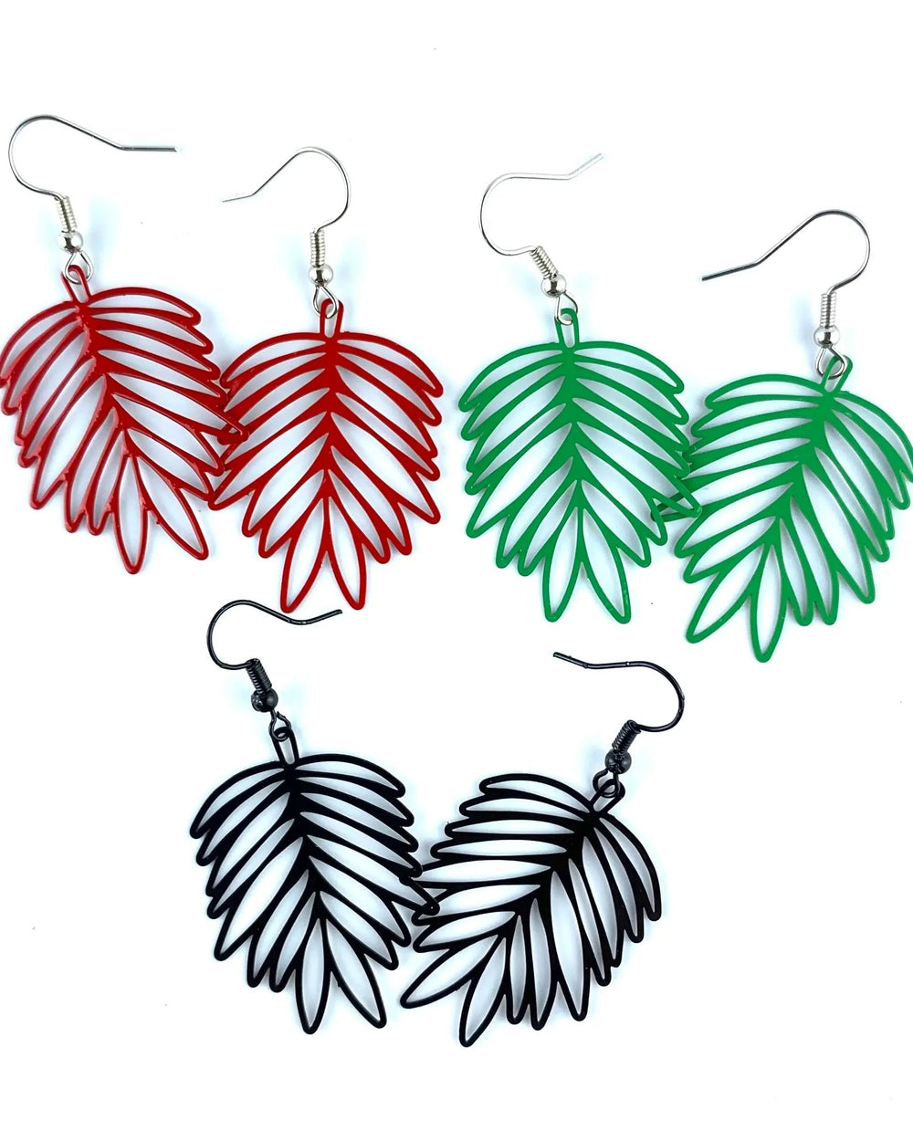 Three colour options of filigree leaf drop earrings in red, green and black