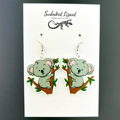 Koala in a Tree Drops