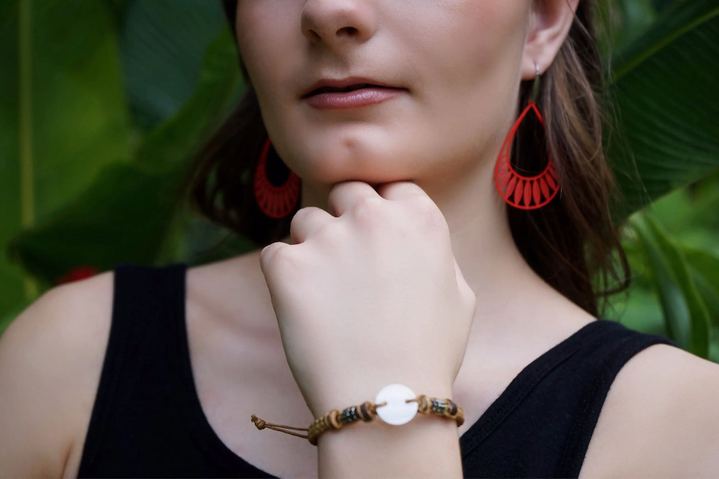 Woman wears Natural Shell Beaded Bracelet