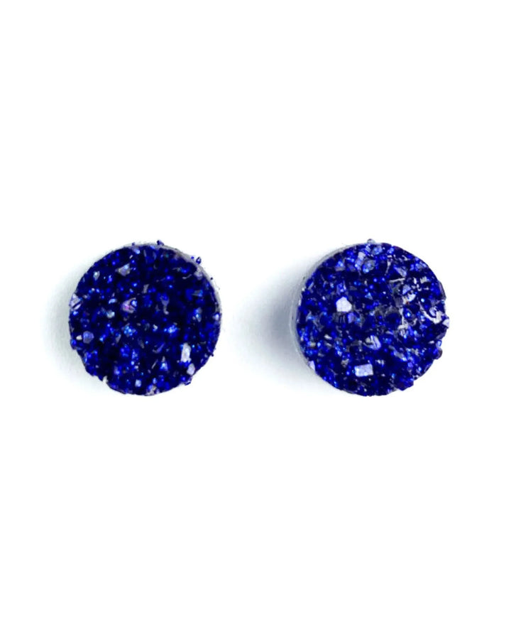 Dark blue glitter Ore Style stud earrings on Sunbaked Lizard Jewellery &amp; Gifts backing card