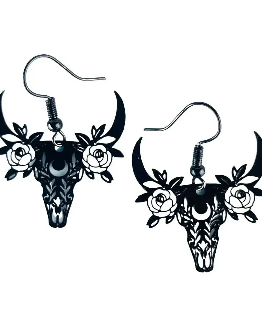 Black floral cowskull filigree drop earrings with crescent moon detail and rose accents on silver hooks