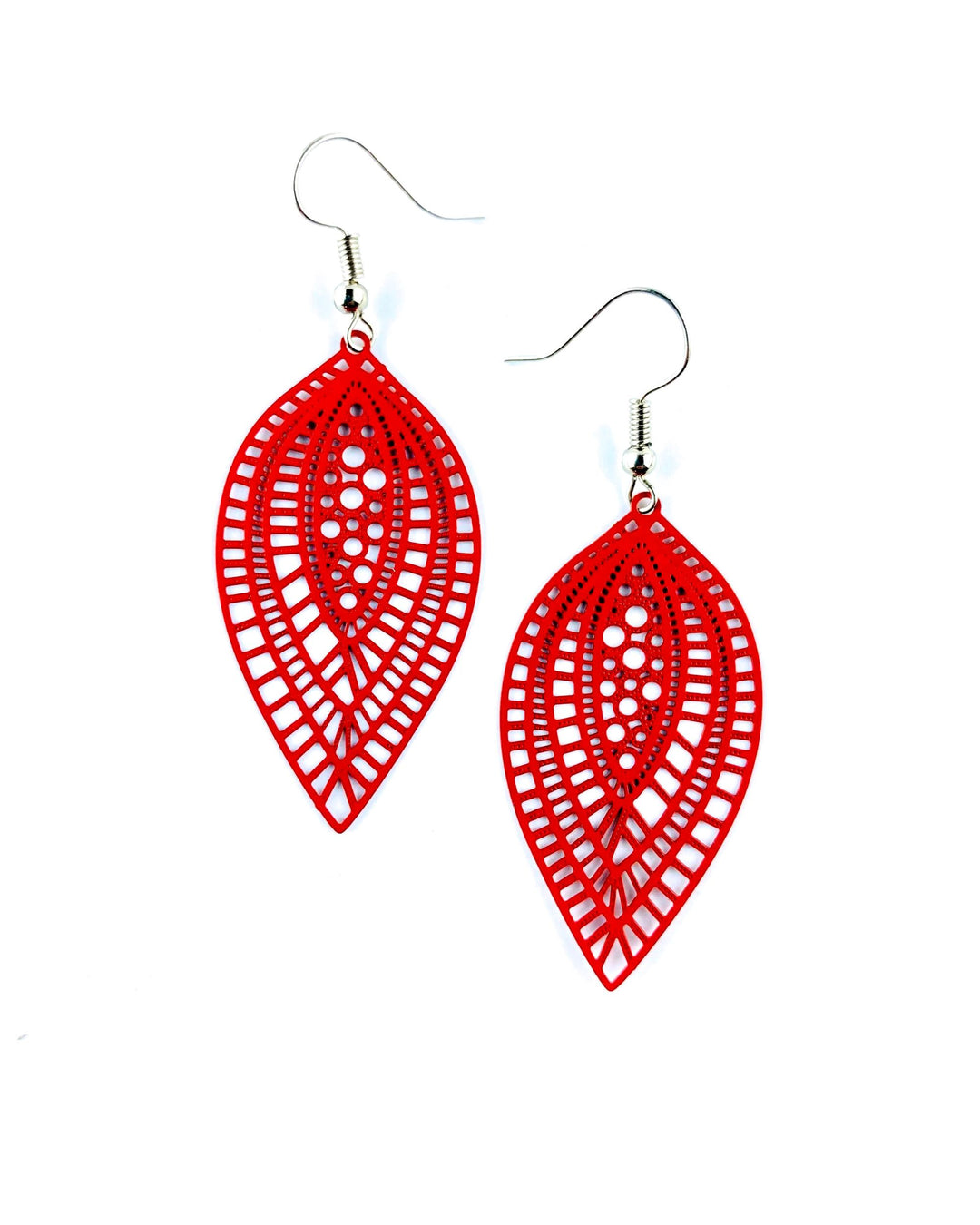 Red botanical leaf dangle earrings with filigree-style cut-out pattern and silver hooks