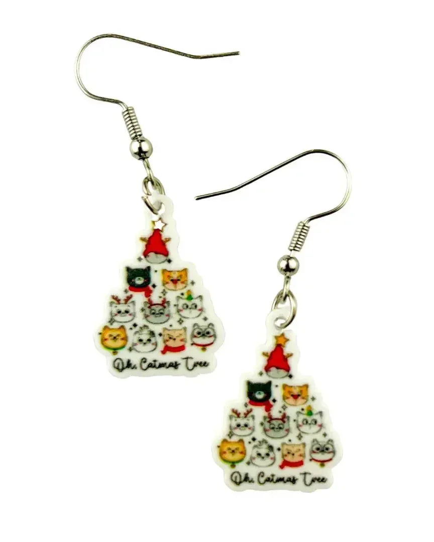 Oh Catmas Tree drop earrings, a Christmas tree of cat faces cut from white acrylic, hanging from silver hooks