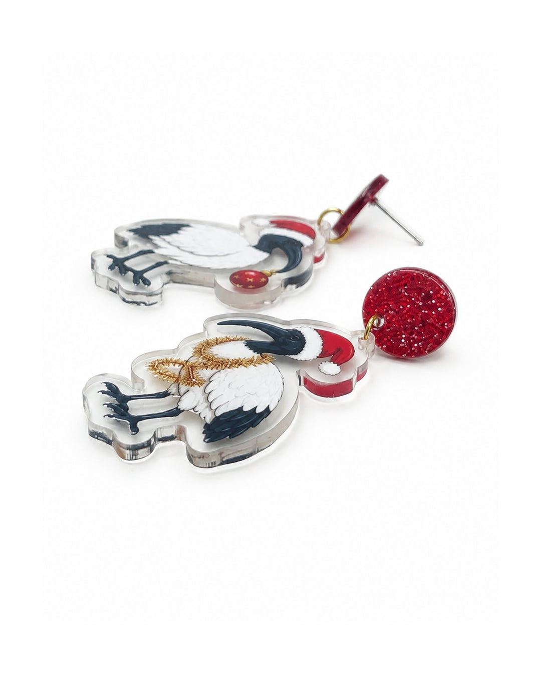 Side view of Christmas ibis earrings showing the flat printed acrylic charm