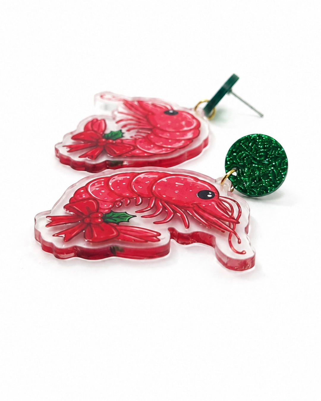 Side view of Christmas prawn earrings showing the flat printed acrylic charm