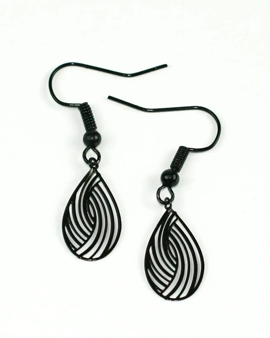Pair of black filigree teardrop drop earrings with delicate cut-out swirl pattern and petite size
