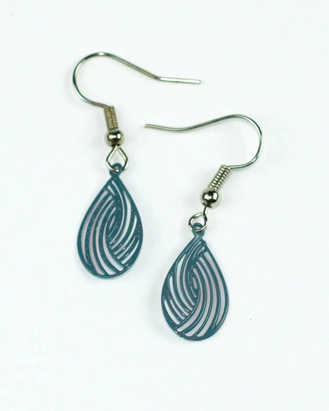 Pair of deep blue filigree teardrop drop earrings with fine cut-out swirl design and petite drop length