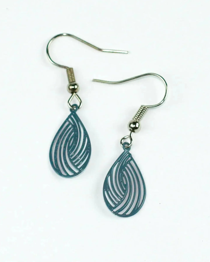 Pair of deep blue filigree teardrop drop earrings with fine cut-out swirl design and petite drop length