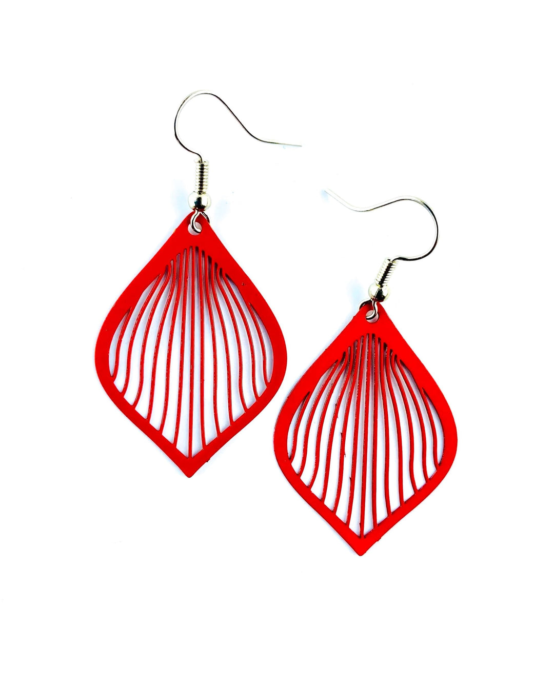 Pair of red filigree teardrop drop earrings with open cut-out lines and lightweight hooks