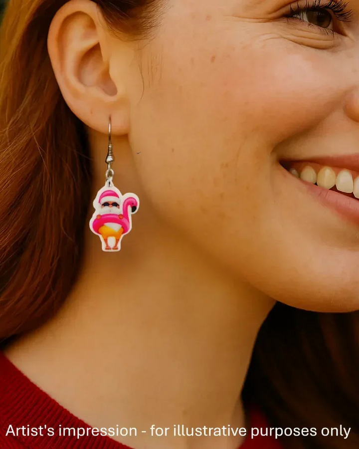 Model wearing a flamingo floaty Santa Christmas earring, showing the size against her ear