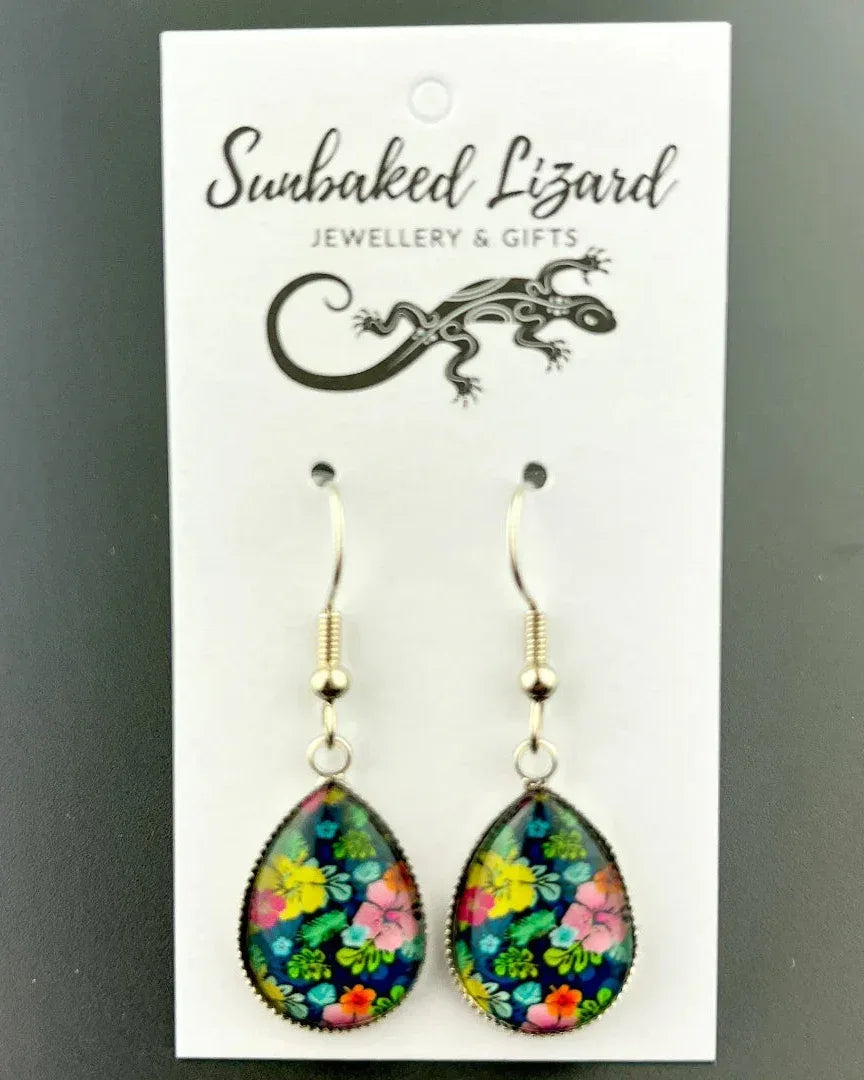 Floral teardrop earrings with colourful flower design displayed on jewellery