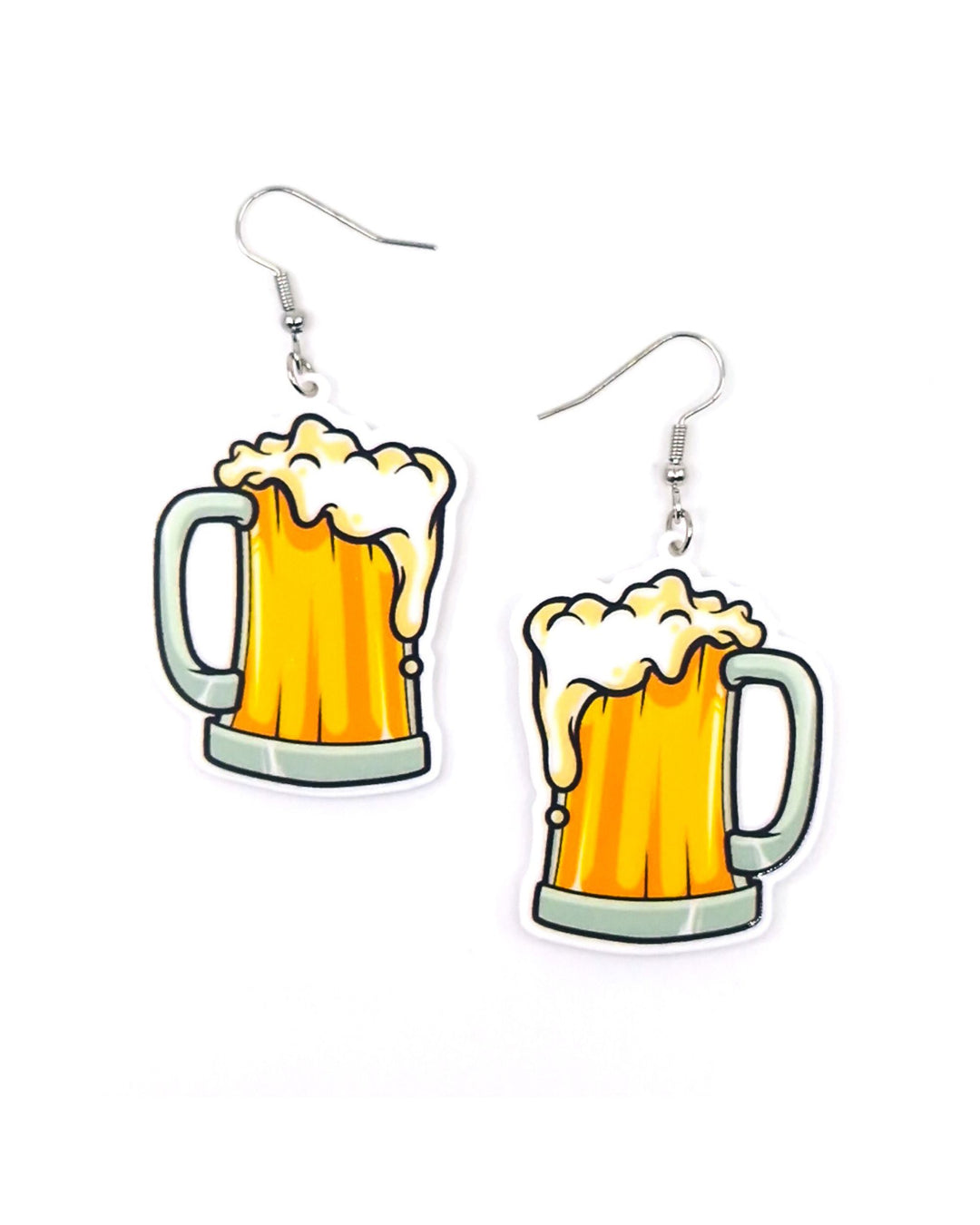 Beer earrings featuring a golden pint mug with white foam on a white background