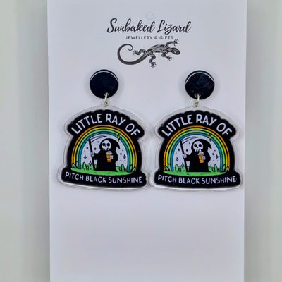 Little Ray of Pitch Black Sunshine Grim Reaper drop earrings in acrylic with rainbow design