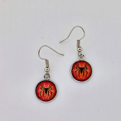 Halloween spider drop earrings with black spider design on fiery red background – creepy-cute novelty jewellery