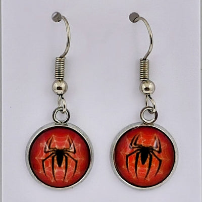 Halloween spider drop earrings with black spider design on fiery red background – creepy-cute novelty jewellery