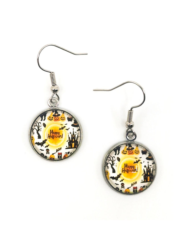 Round glass Halloween earrings with pumpkin characters, bats and Happy Halloween text on white background, silver hooks