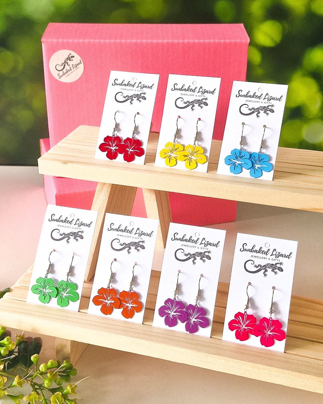 Hibiscus earrings gift set with seven colourful flower dangles displayed together