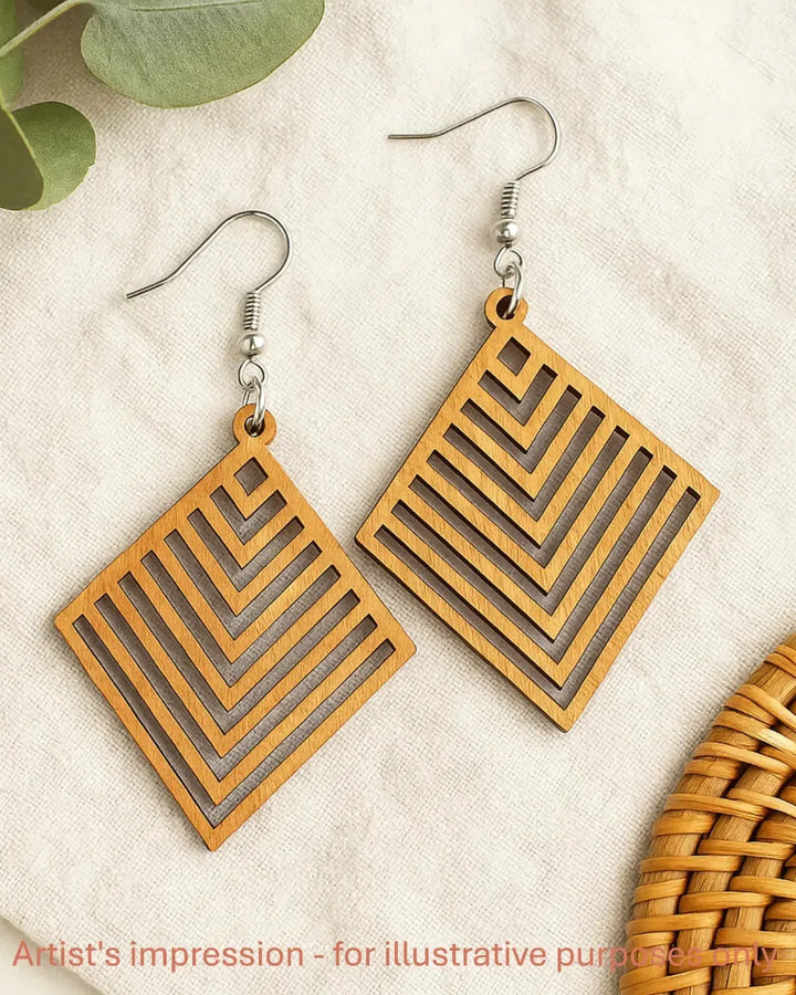 Flat lay of Izzy geometric diamond timber earrings on neutral fabric background