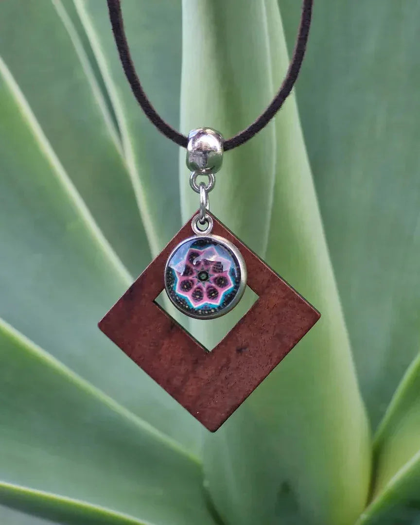 Geometric timber pendant with pink mandala glass detail