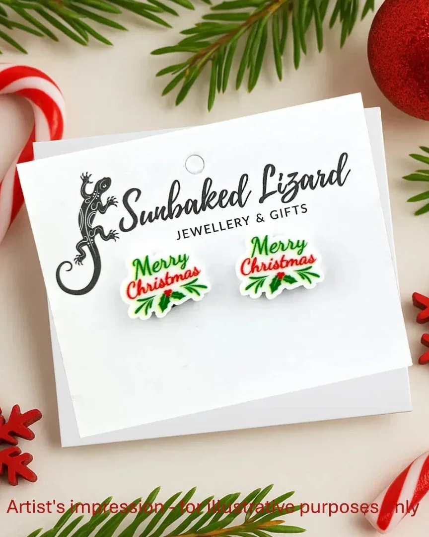 Merry Christmas stud earrings on a Sunbaked Lizard backing card, ready to gift