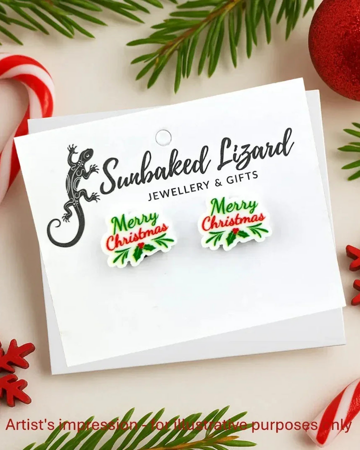 Merry Christmas stud earrings on a Sunbaked Lizard backing card, ready to gift