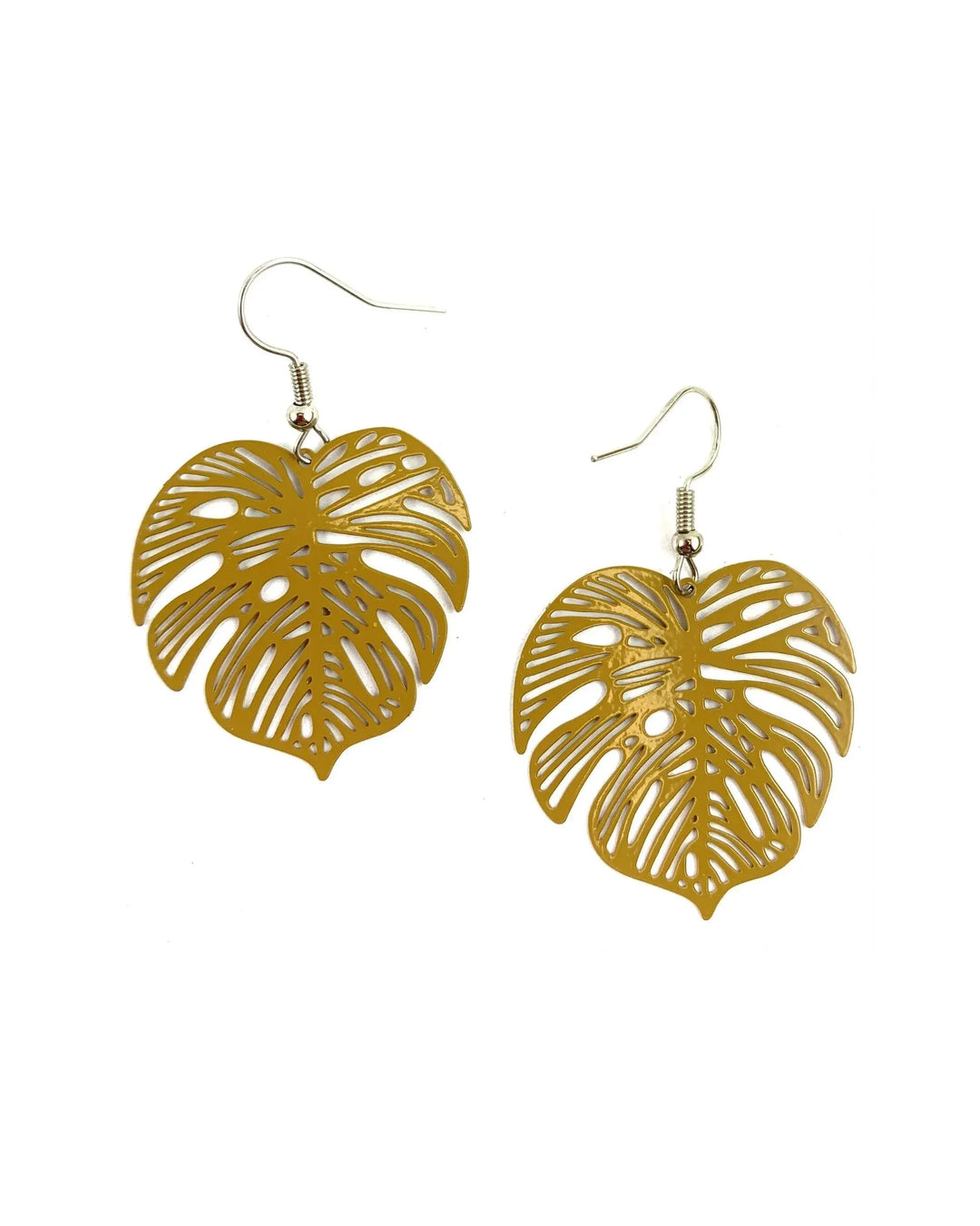 Mustard monstera leaf drop earrings with cut-out detail on white background