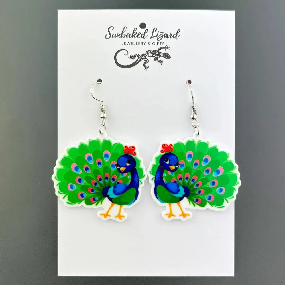 Peacock drop earrings, fully fanned peacock acrylic charm on silver hooks on Sunbaked Lizard backing card