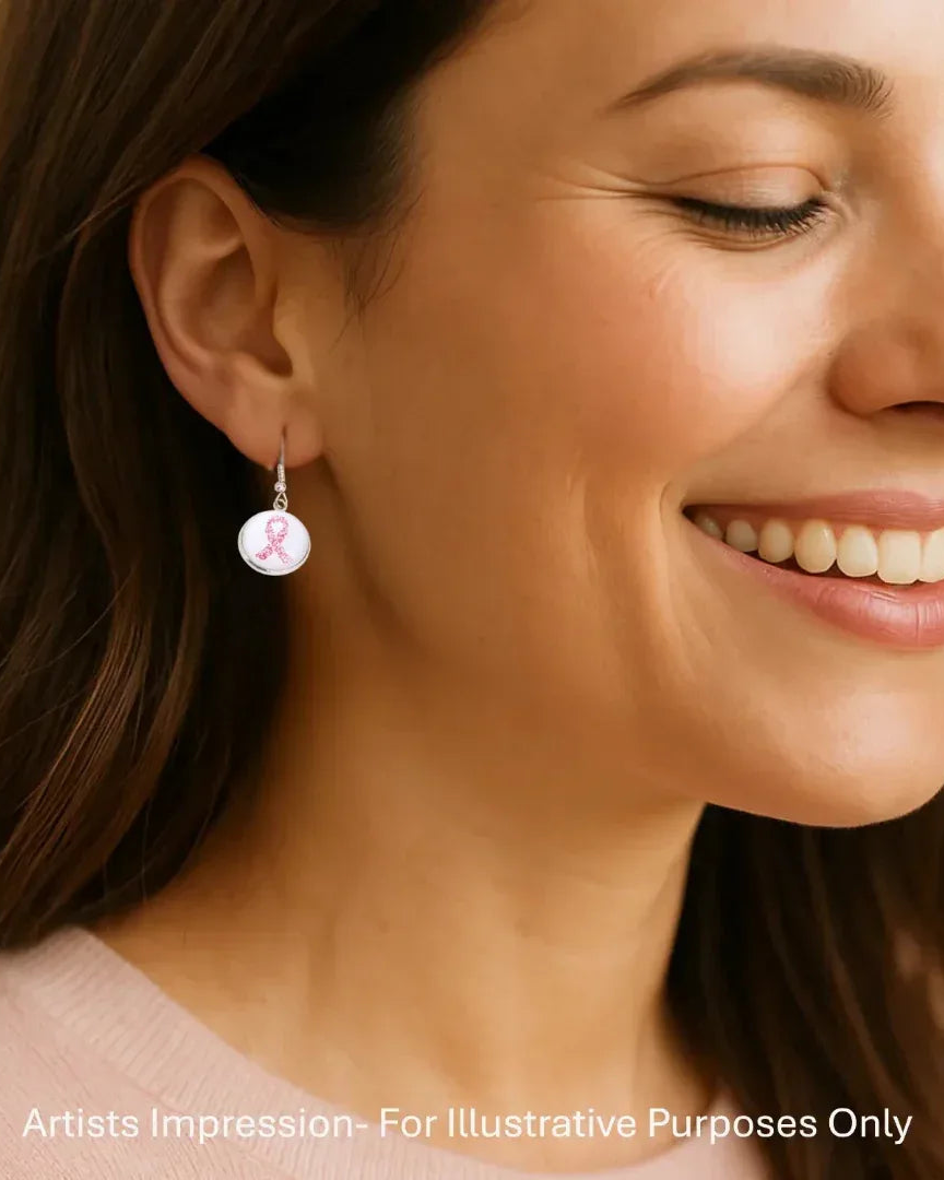 Model wearing pink ribbon drop earrings, showing the 32mm length
