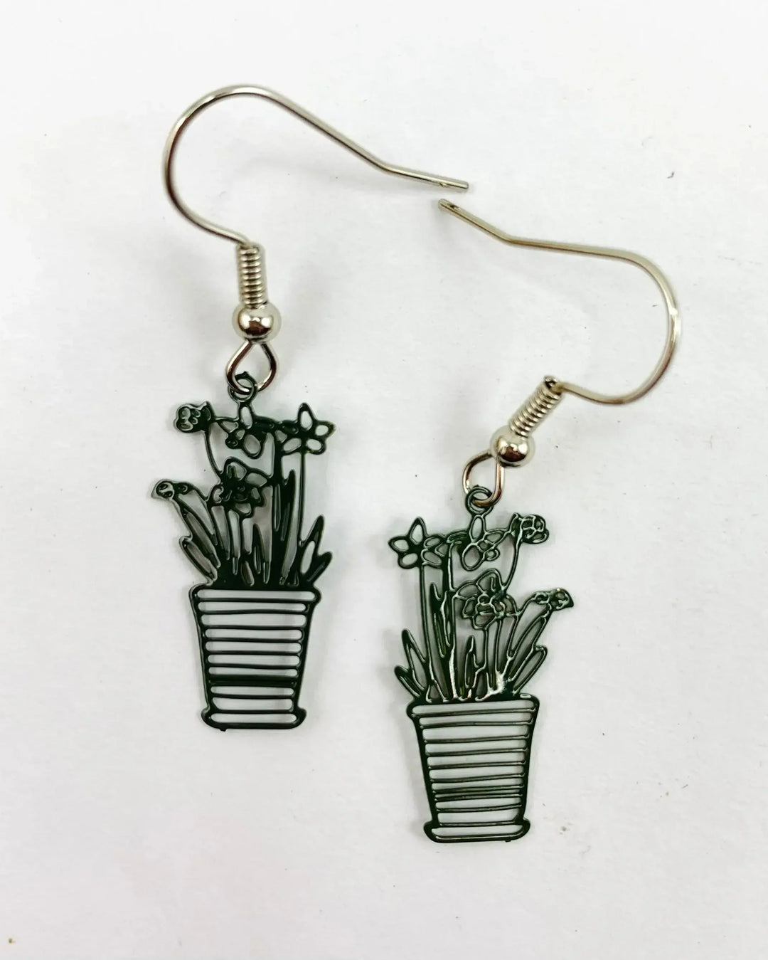 Drak Green potted flower earrings with fine cut-out petals and grass blades in a ribbed terracotta pot
