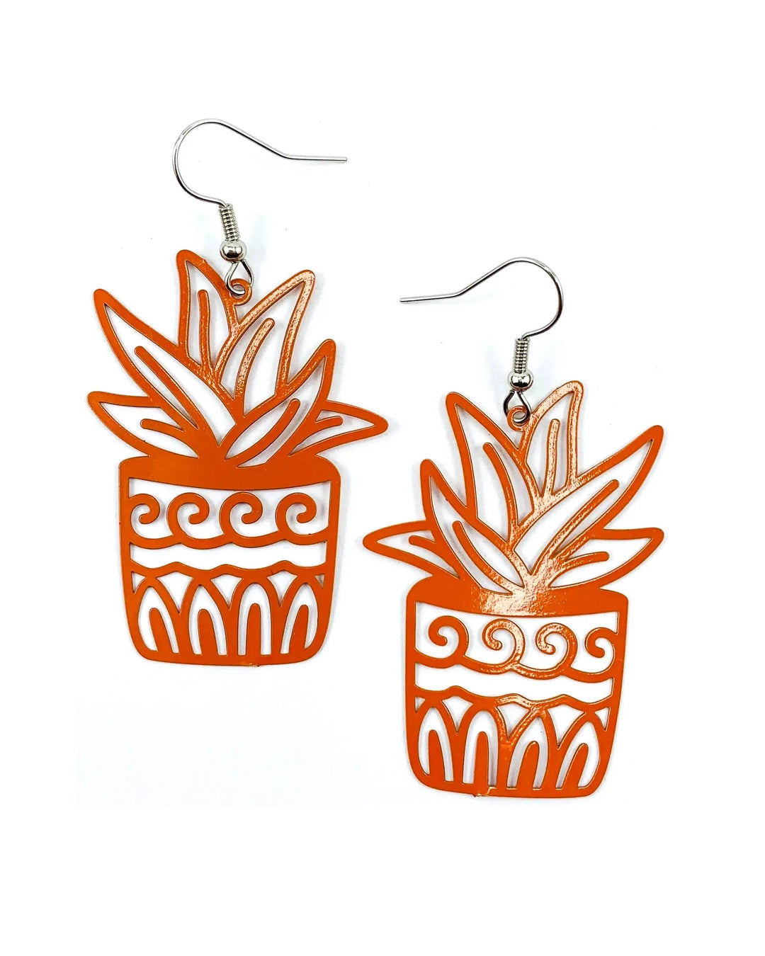 Orange potted plant statement earrings with bold cut-out spiky leaves in a patterned pot