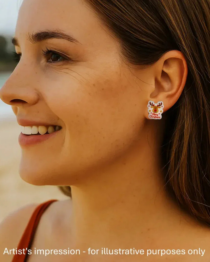Model wearing a reindeer Christmas stud earring, showing the size against her ear