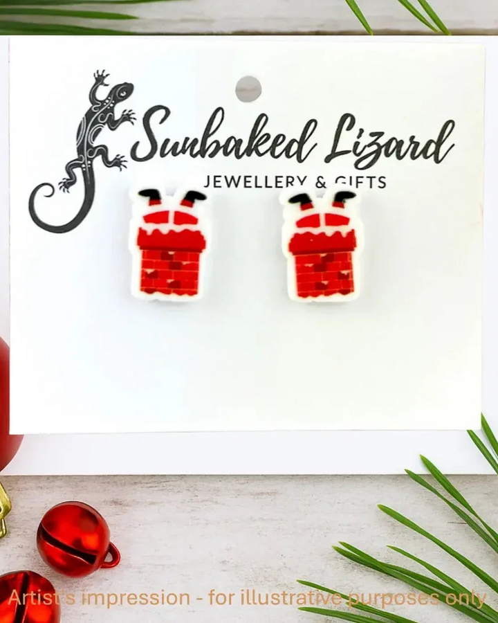 Santa in the chimney stud earrings on a Sunbaked Lizard backing card