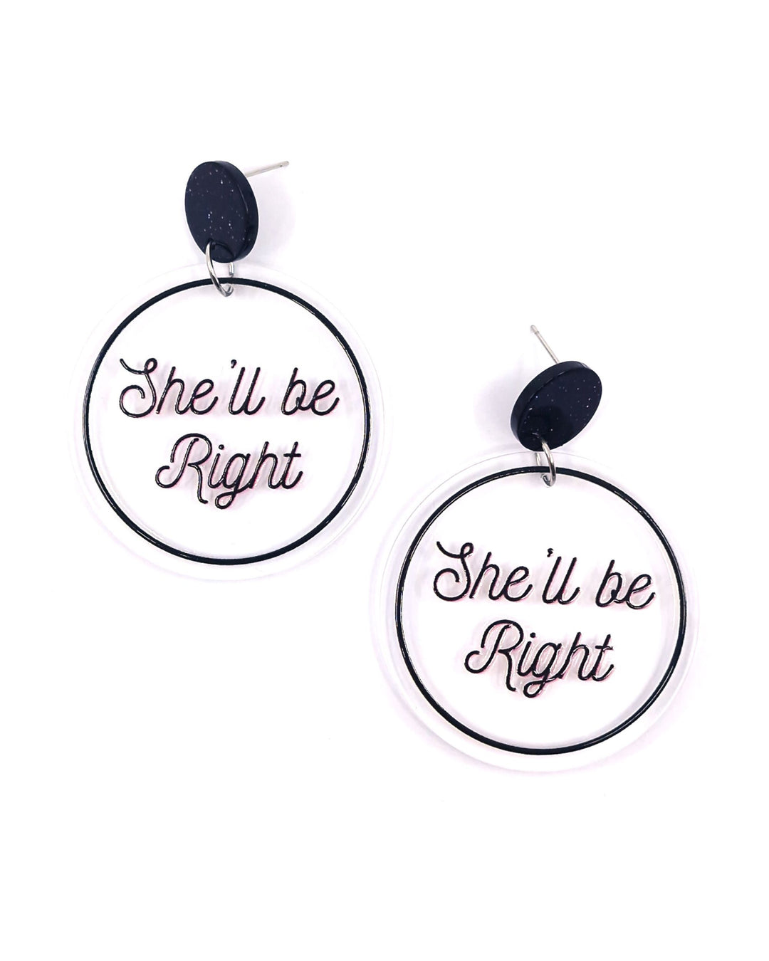 She’ll Be Right acrylic statement earrings with black script on clear round drops and glitter black studs.