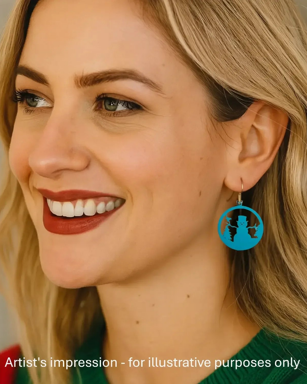 Teal snowman Christmas earrings with a cut-out snowman and pine trees, on stainless steel hooks on a model
