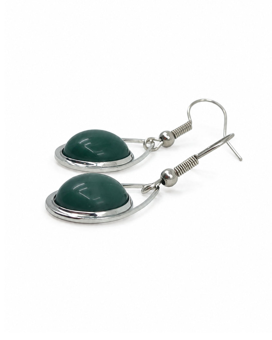 Side view of green stone teardrop earrings showing the raised dome in a silver-coloured setting